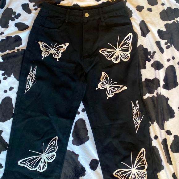 Black jeans with butterfly prom on front - Picture 1 of 3